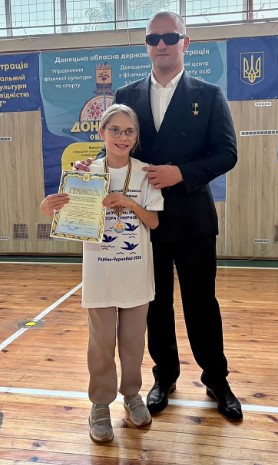 Віталій Смірнов з юною чемпіонкою.